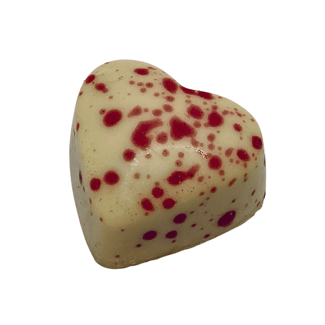 White Passion Fruit Heart with a milk ganache centre and pink speckled design