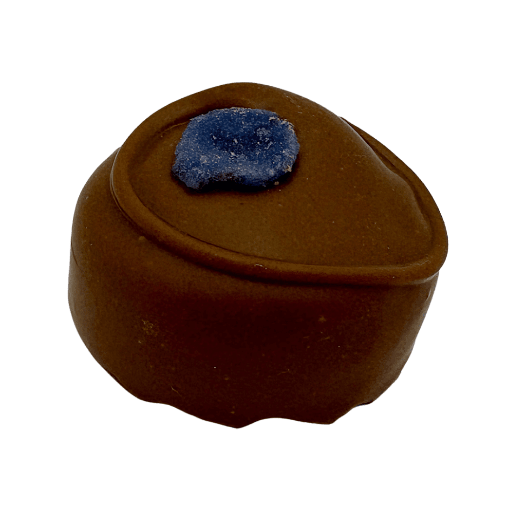Milk Violet Cream in milk chocolate with a crystallised violet petal