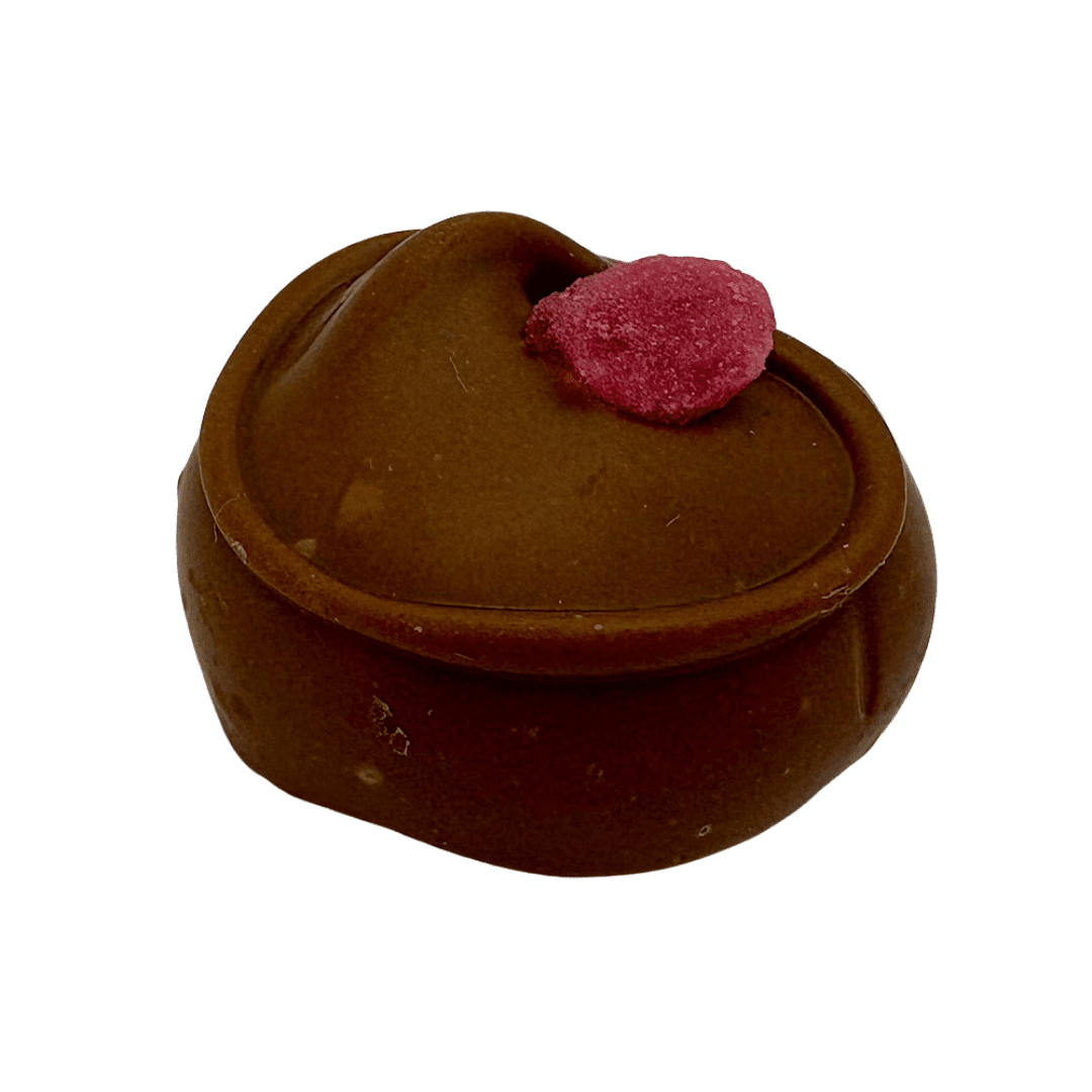 Milk Rose Cream in milk chocolate with a crystallised rose petal